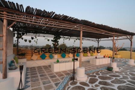 Farm-Rustic sit-out under pergola